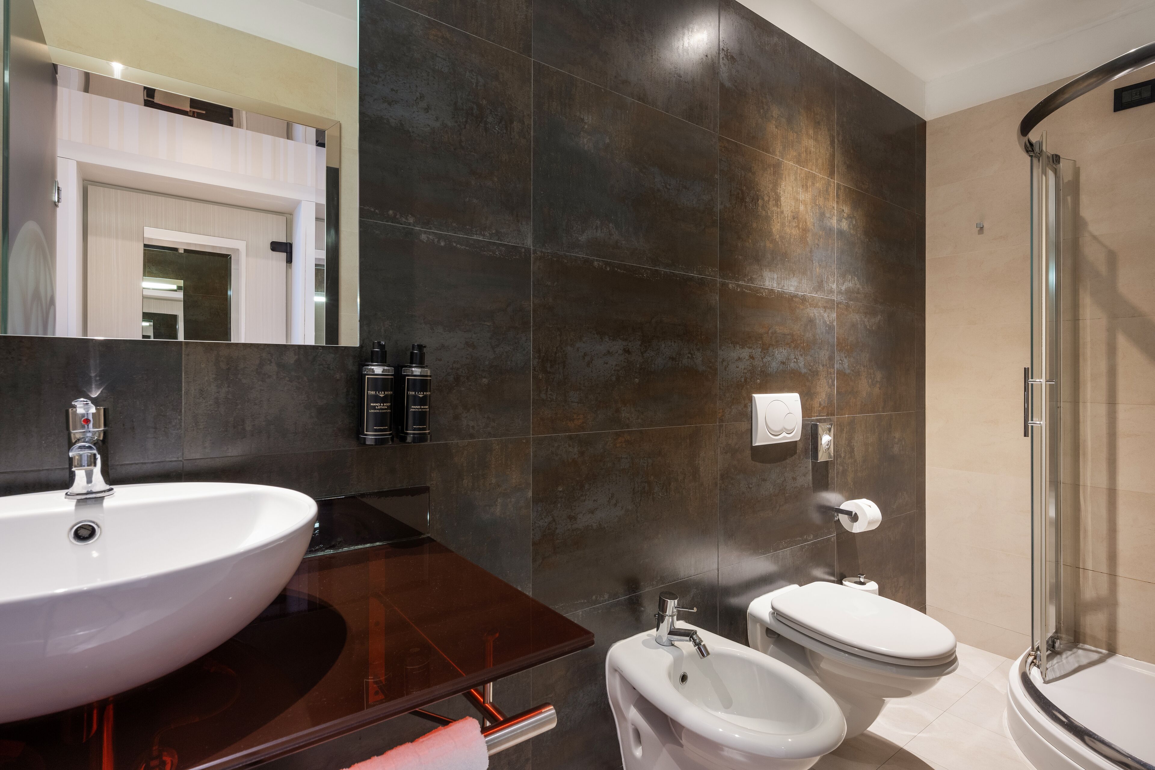 rainfall showerhead, designer toiletries, hair dryer, bidet