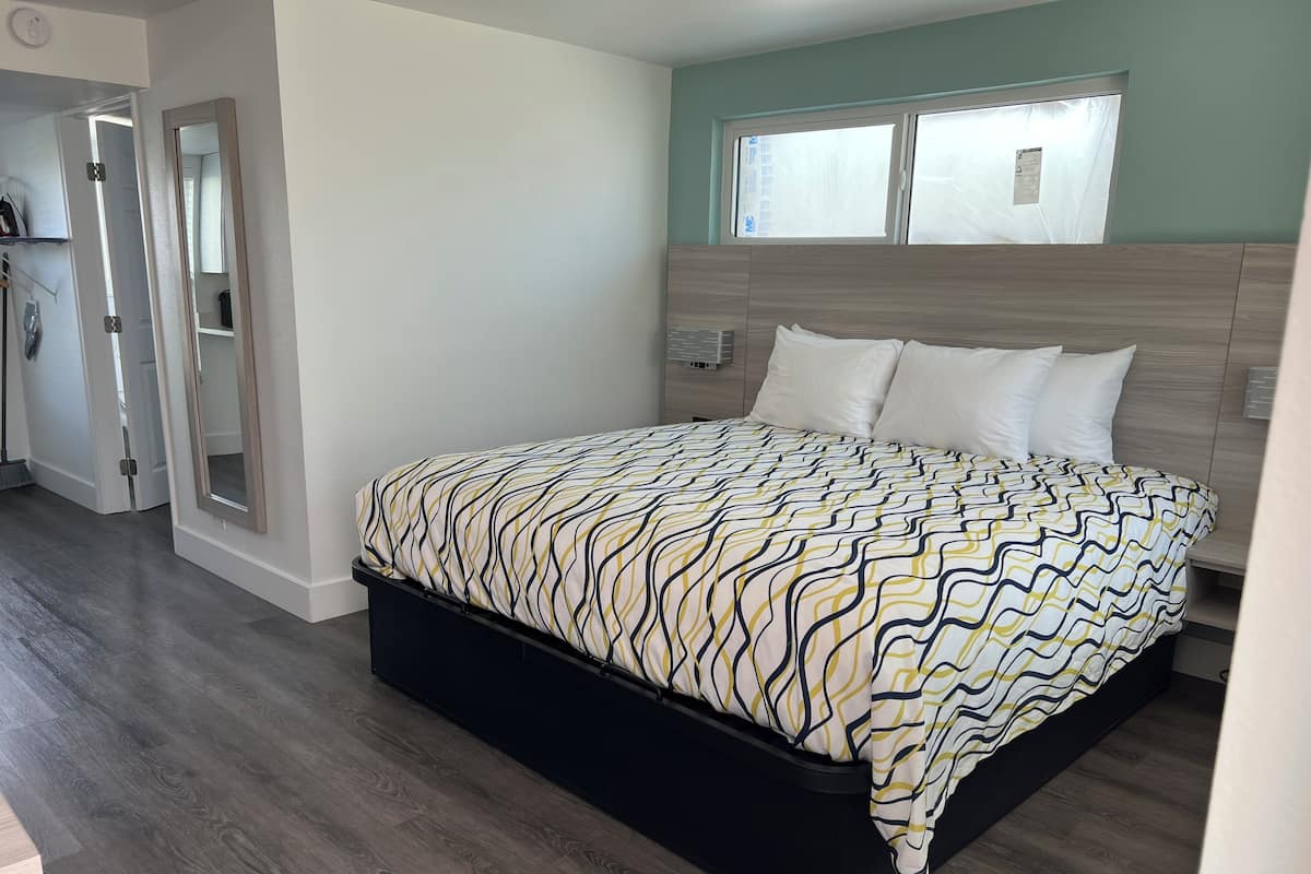 Chambre Deluxe | Literie de qualité, lit avec matelas à plateau-coussin