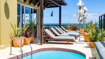 Outdoor pool, pool umbrellas, sun loungers