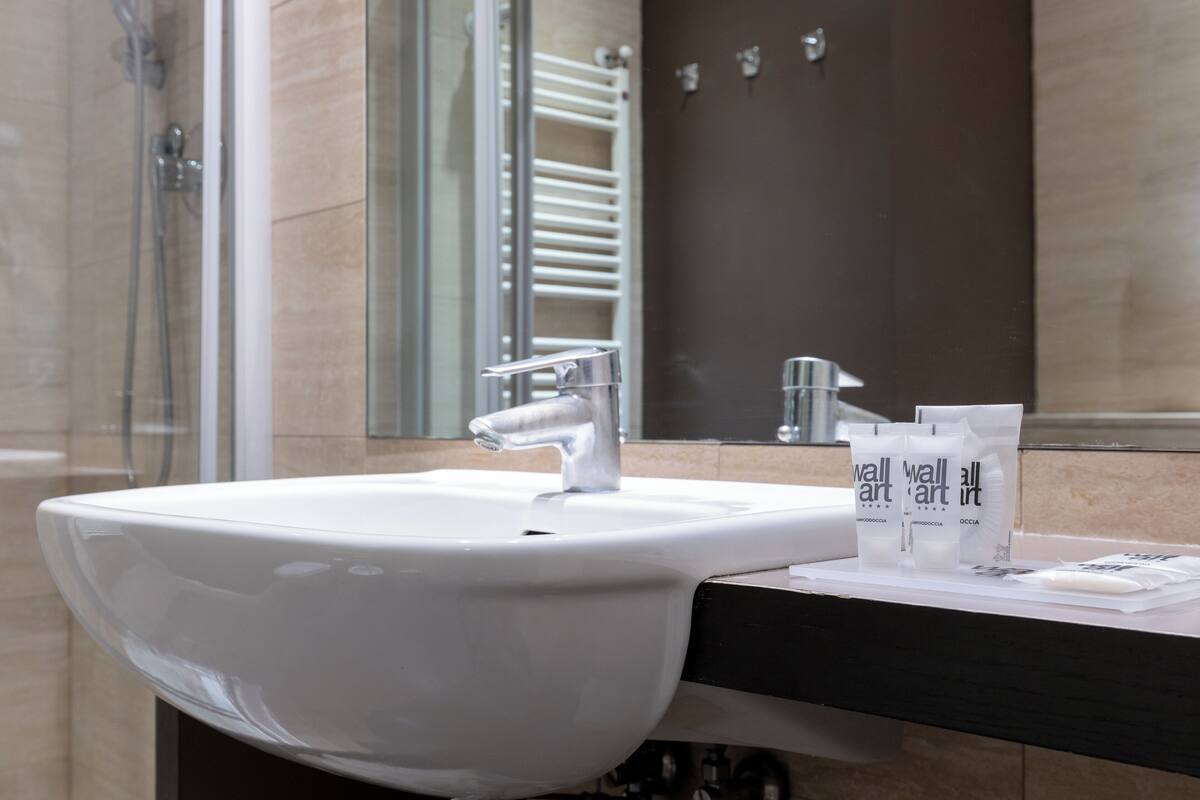 shower, hair dryer, slippers, bidet