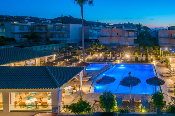 Seasonal outdoor pool, pool umbrellas, pool loungers