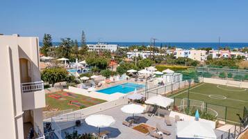 Seasonal outdoor pool, pool umbrellas, pool loungers