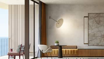 Deluxe Room, Balcony, Sea View | Minibar, in-room safe, desk, blackout curtains