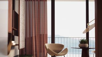 Suite Deluxe | Minibar, coffres-forts dans les chambres, bureau, rideaux occultants