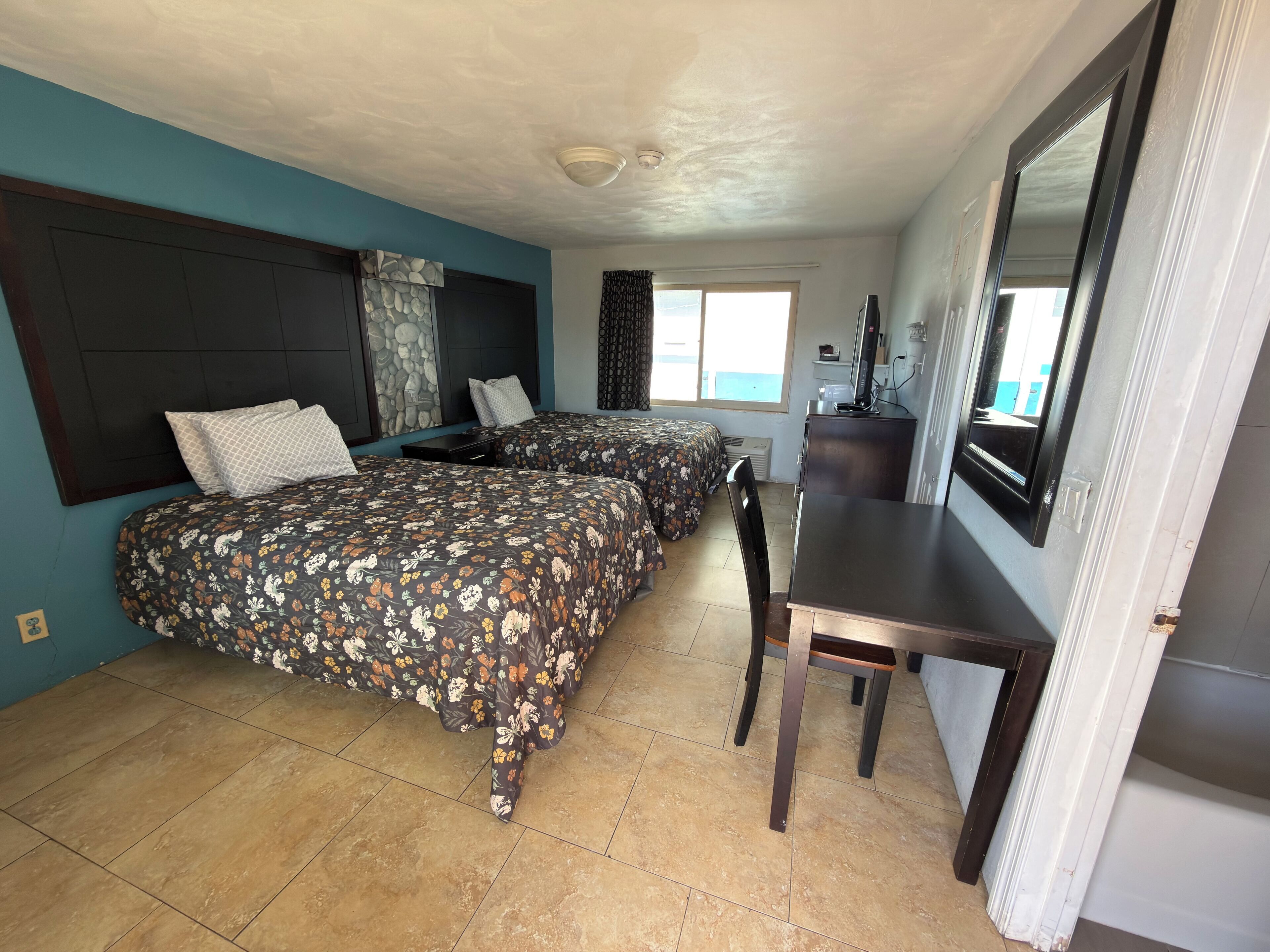 Standard Room, 2 Double Beds | Individually decorated, individually furnished, desk, free WiFi