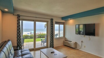 Apartment, 1 Bedroom, Oceanfront | Living area | TV