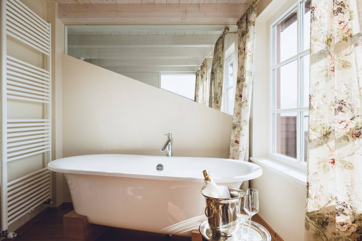 luxury suite | bathroom | free toiletries, hair dryer, bathrobes, slippers