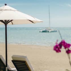 On the beach, sun loungers, beach umbrellas, beach towels