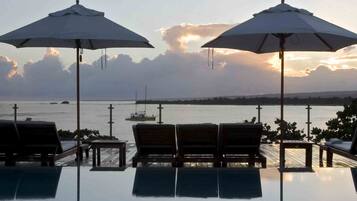 Outdoor pool, free pool cabanas, pool umbrellas