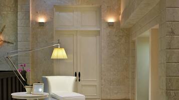 Experience the grandeur of our lobby, featuring a high ceiling, polished floor, and elegant design.