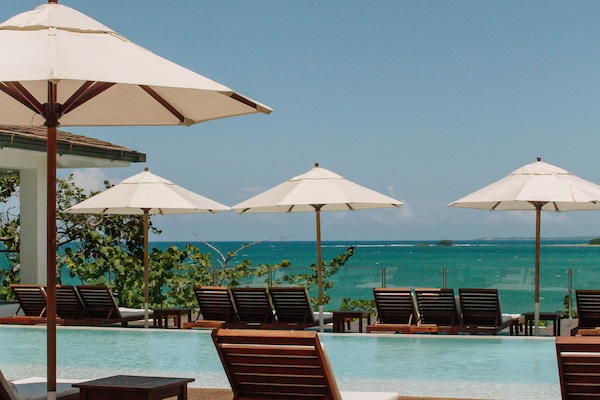 Outdoor pool, free pool cabanas, pool umbrellas