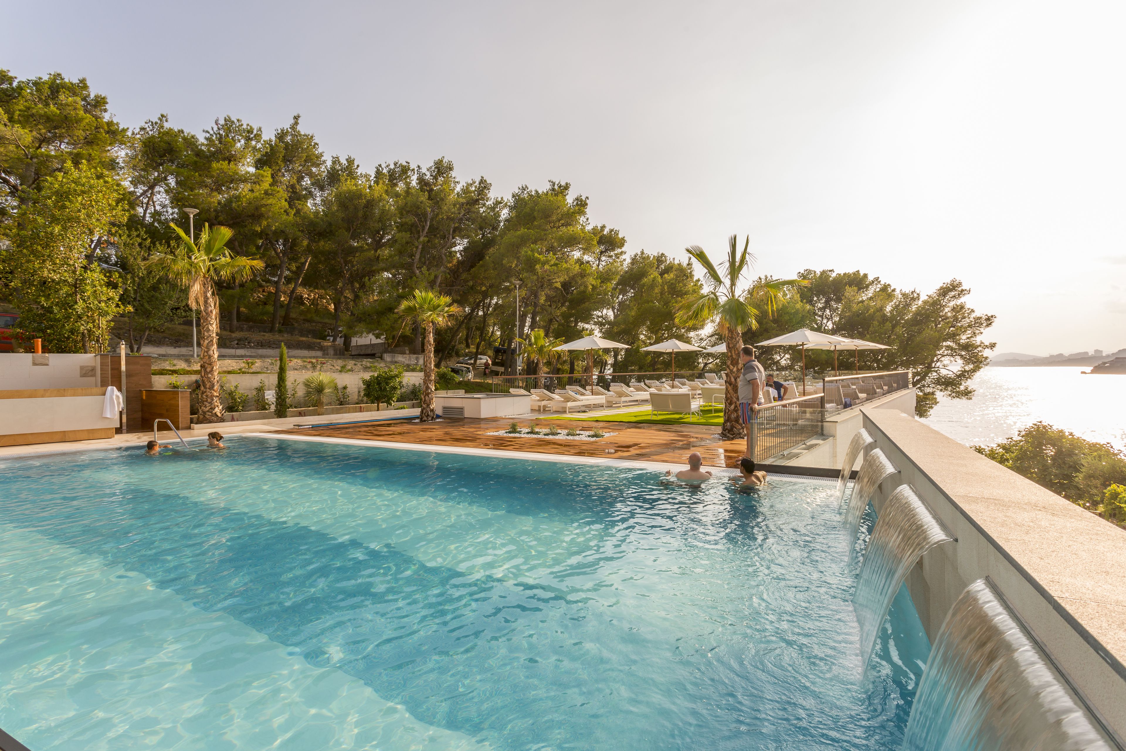 indoor pool, outdoor pool, open 9:30 am to 9 pm, pool loungers