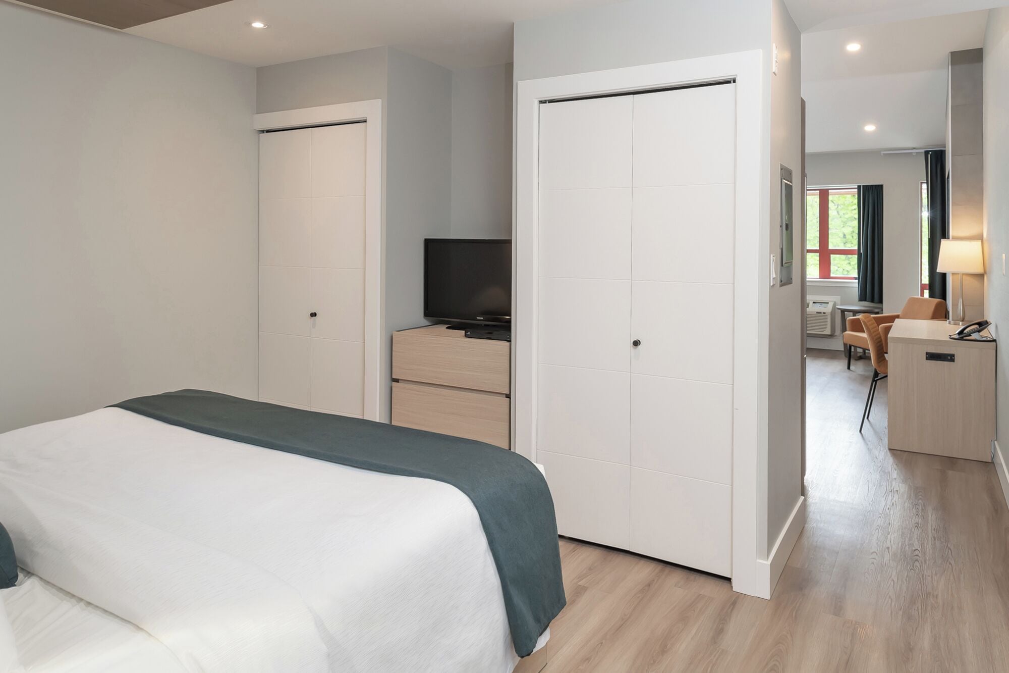 junior suite, 1 king bed with sofa bed, mountain view | premium bedding, desk, blackout curtains, iron/ironing board