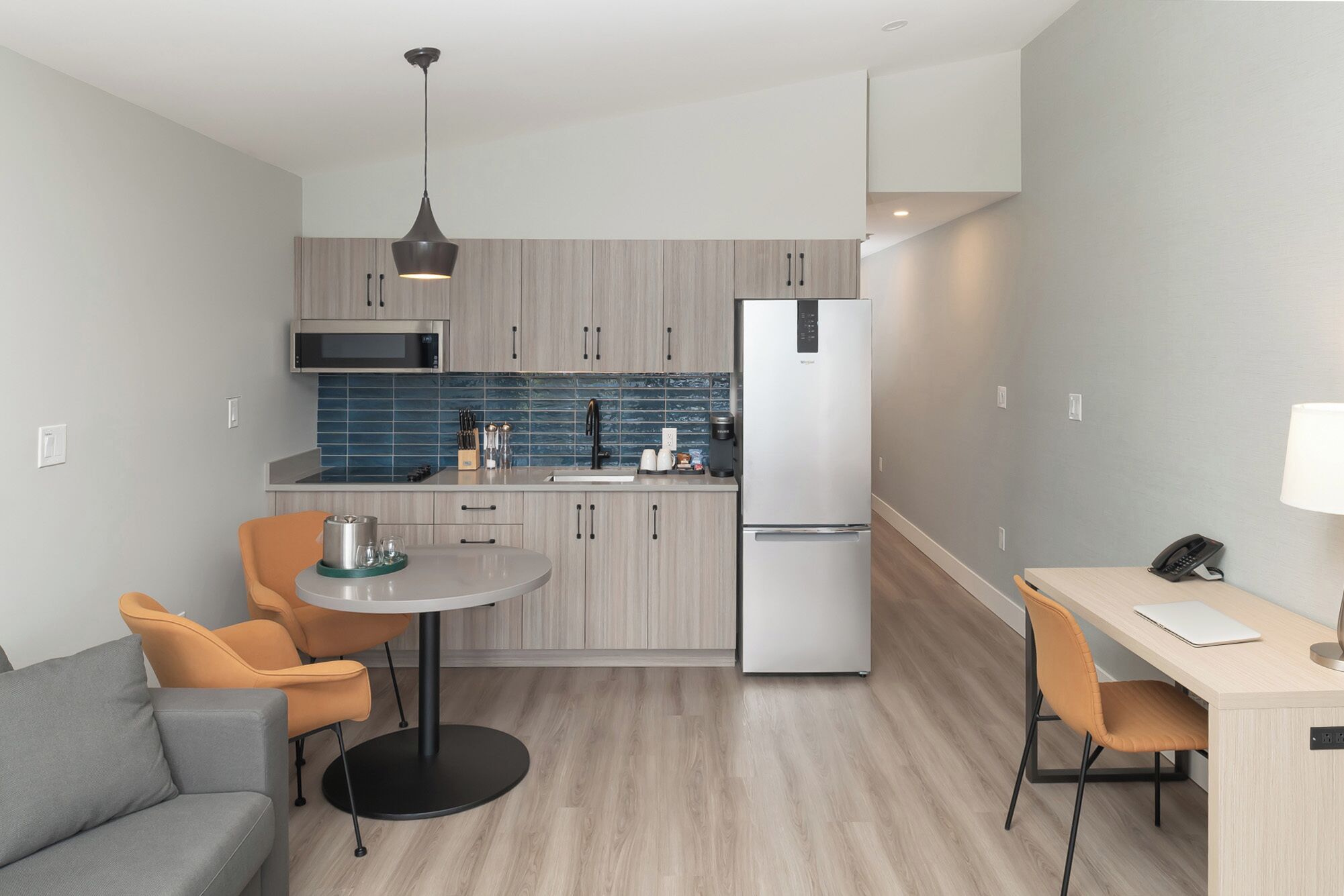 junior suite, 1 king bed with sofa bed, lake view | private kitchenette | fridge, microwave, coffee/tea maker, electric kettle