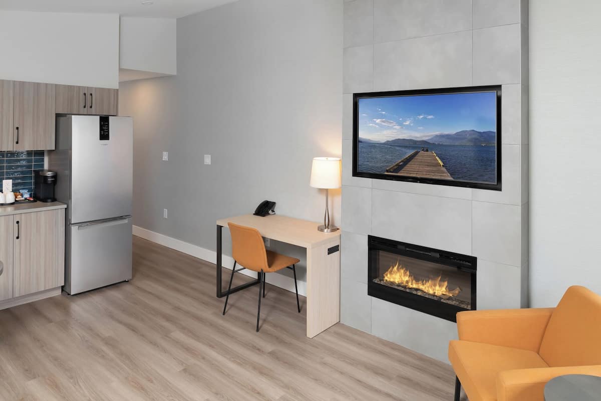 premium bedding, desk, blackout curtains, iron/ironing board