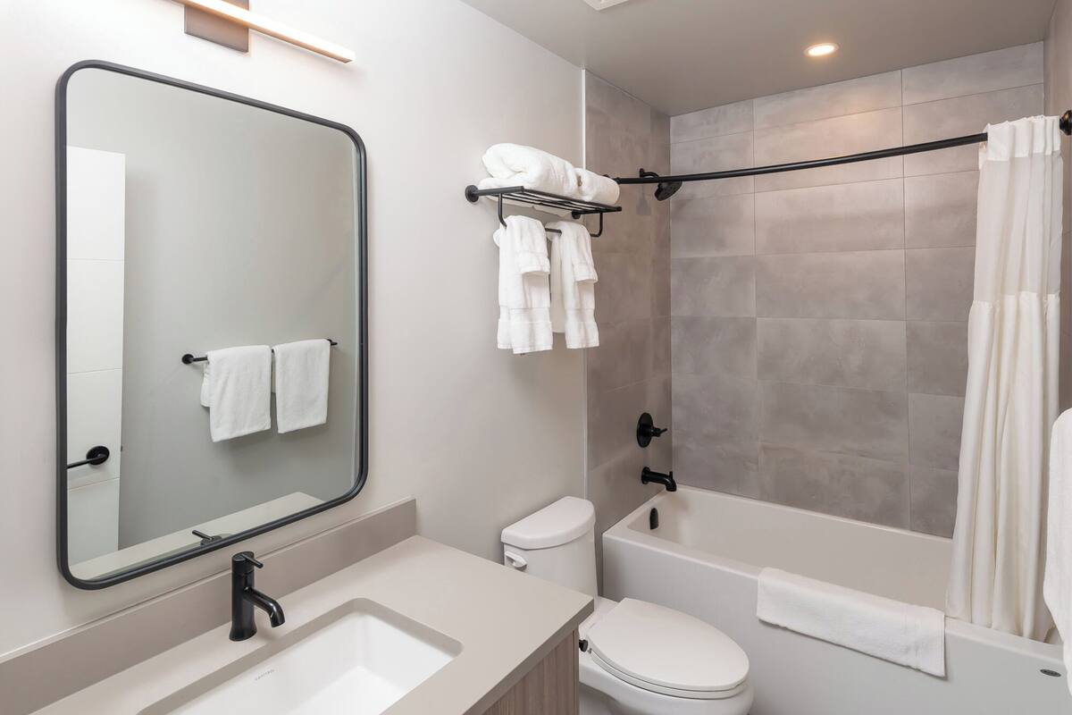 junior suite, 1 king bed with sofa bed, mountain view | premium bedding, desk, blackout curtains, iron/ironing board