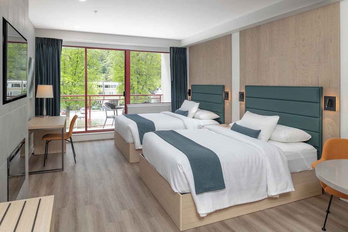 Deluxe Room, 2 Queen Beds, Mountain View | Premium bedding, desk, blackout curtains, iron/ironing board