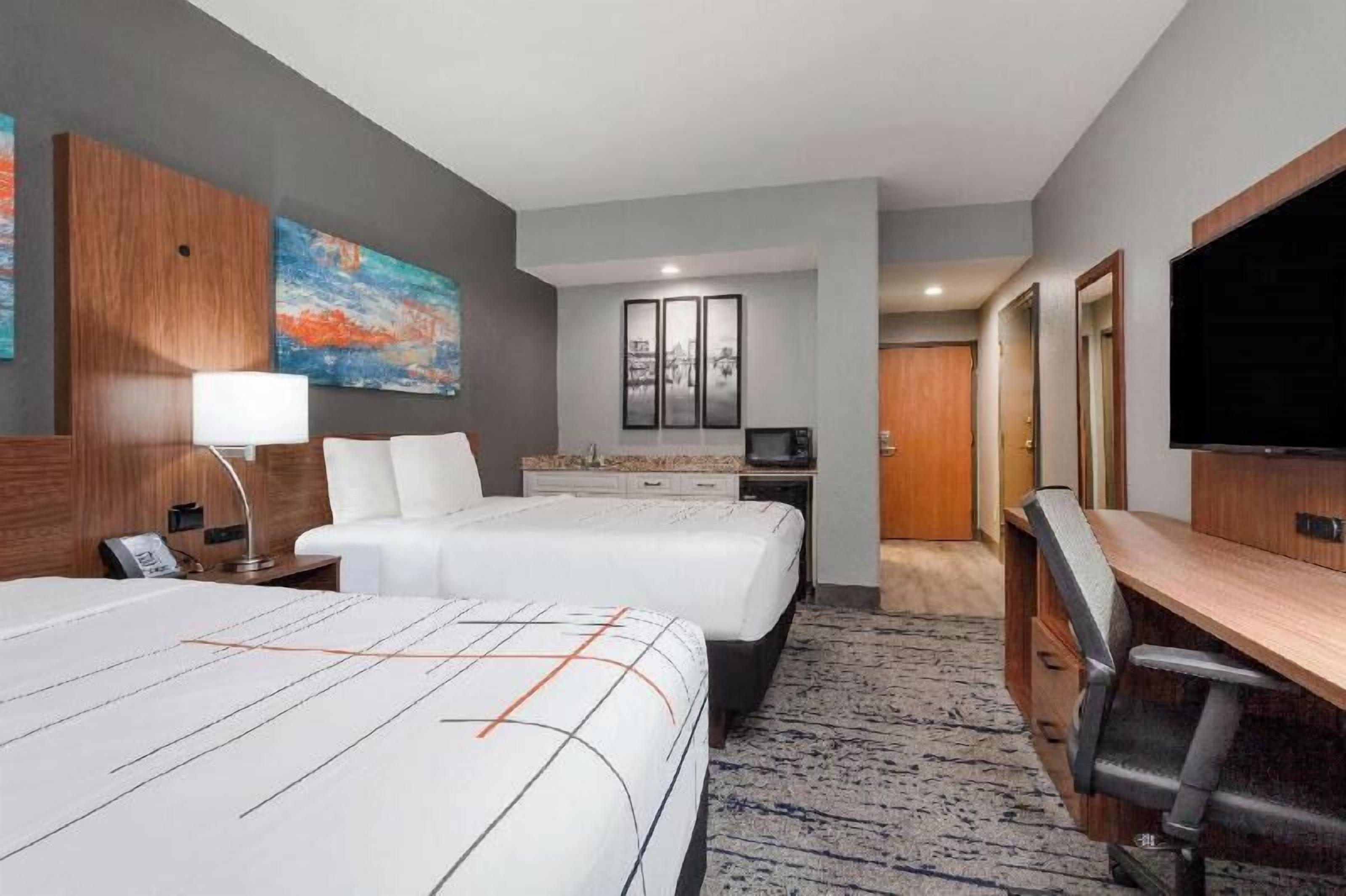 Premium bedding, pillow-top beds, in-room safe, desk