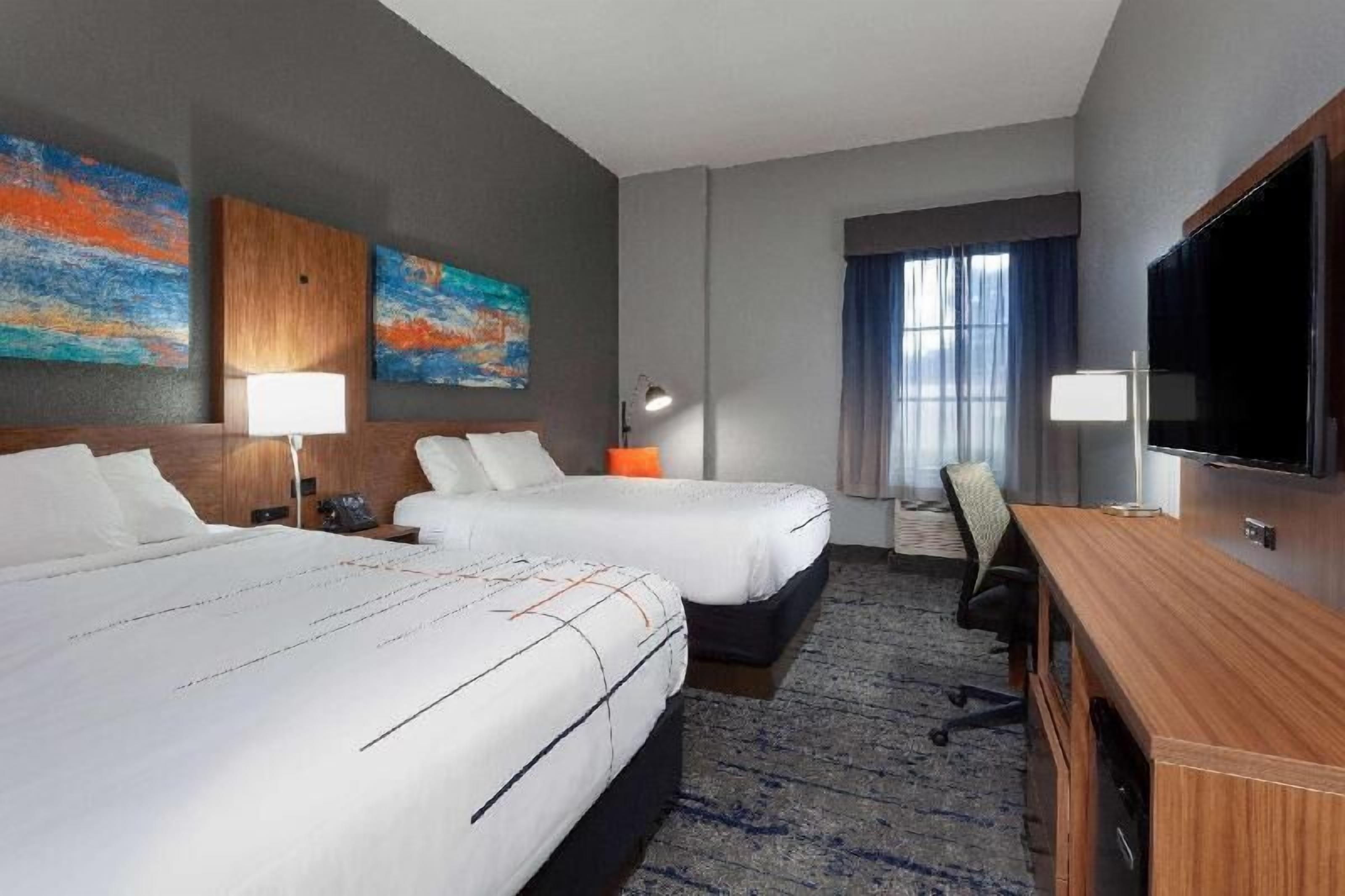 Premium bedding, pillow-top beds, in-room safe, desk