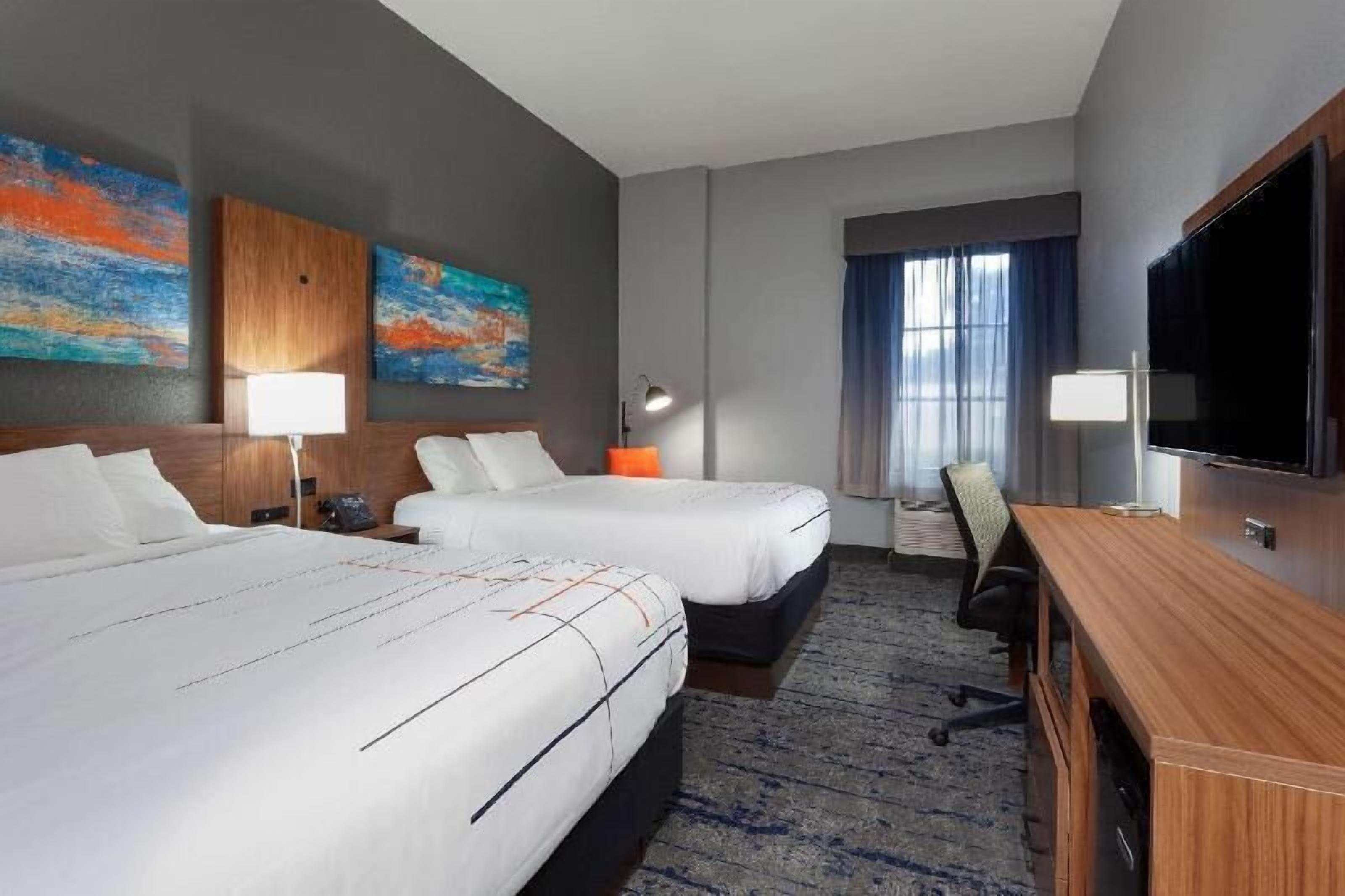 Premium bedding, pillow-top beds, in-room safe, desk