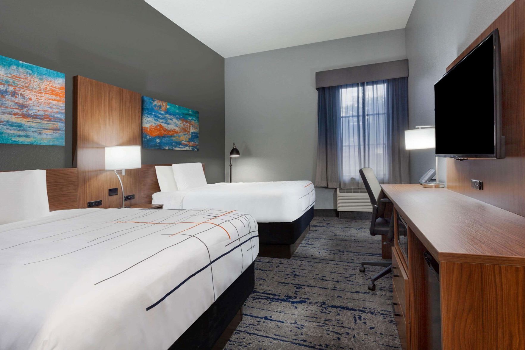 Premium bedding, pillow-top beds, in-room safe, desk