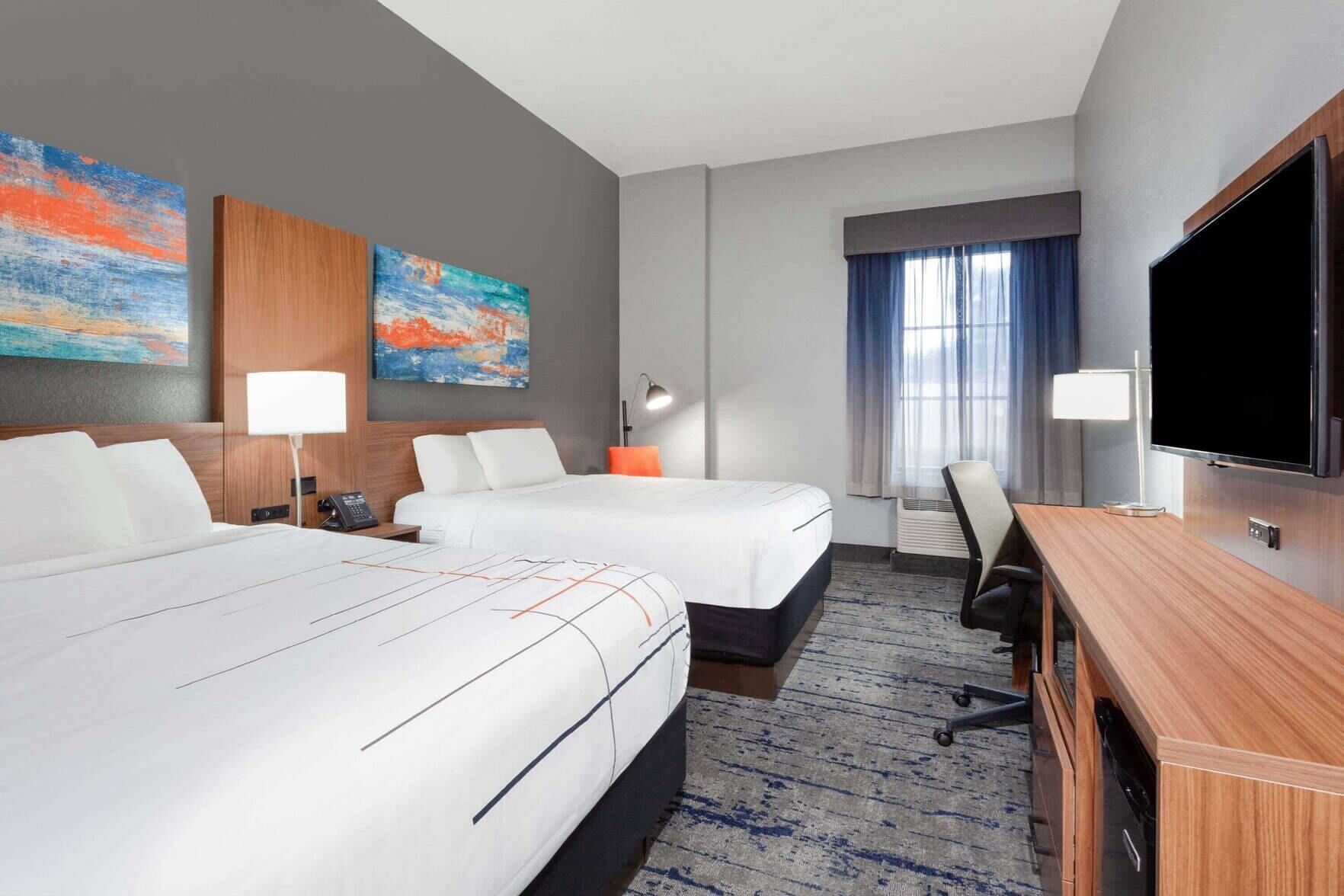 Premium bedding, pillow-top beds, in-room safe, desk