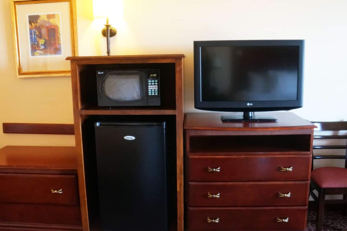 desk, laptop workspace, blackout curtains, iron/ironing board