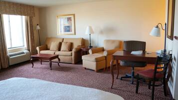 Desk, laptop workspace, blackout drapes, iron/ironing board