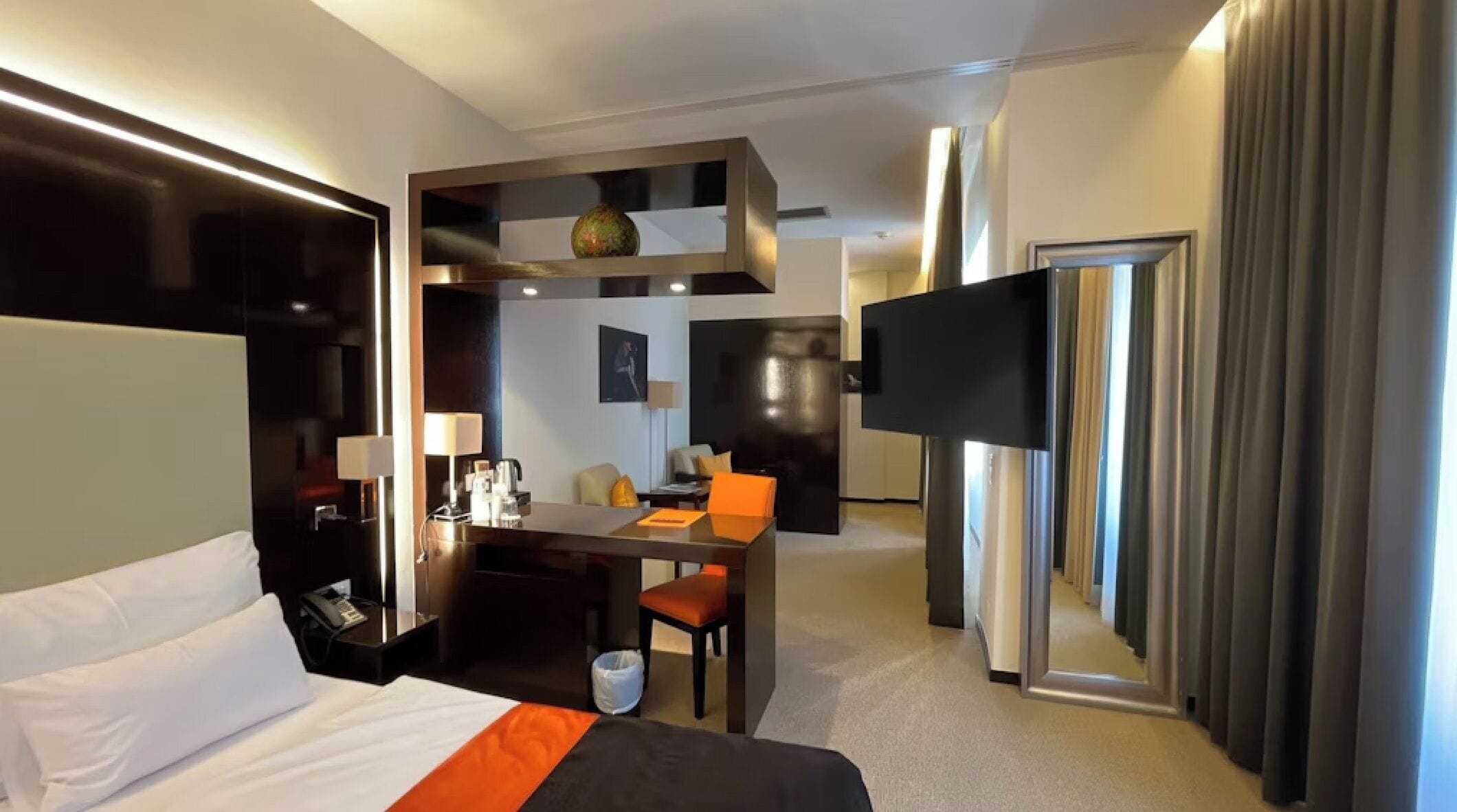 Free minibar items, in-room safe, desk, blackout drapes