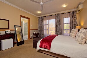 Luxury Room, 1 Bedroom | Premium bedding, minibar, in-room safe, individually decorated - Centurion Golf Suites Boca Walk (Centurion)