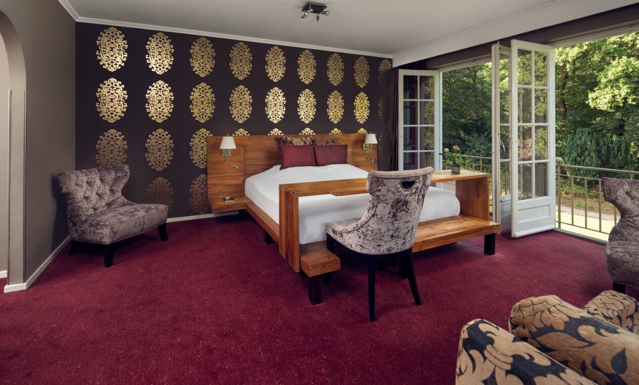 Junior suite, 1 kingsize bed | Select Comfort-bedden, een minibar, een kluis op de kamer