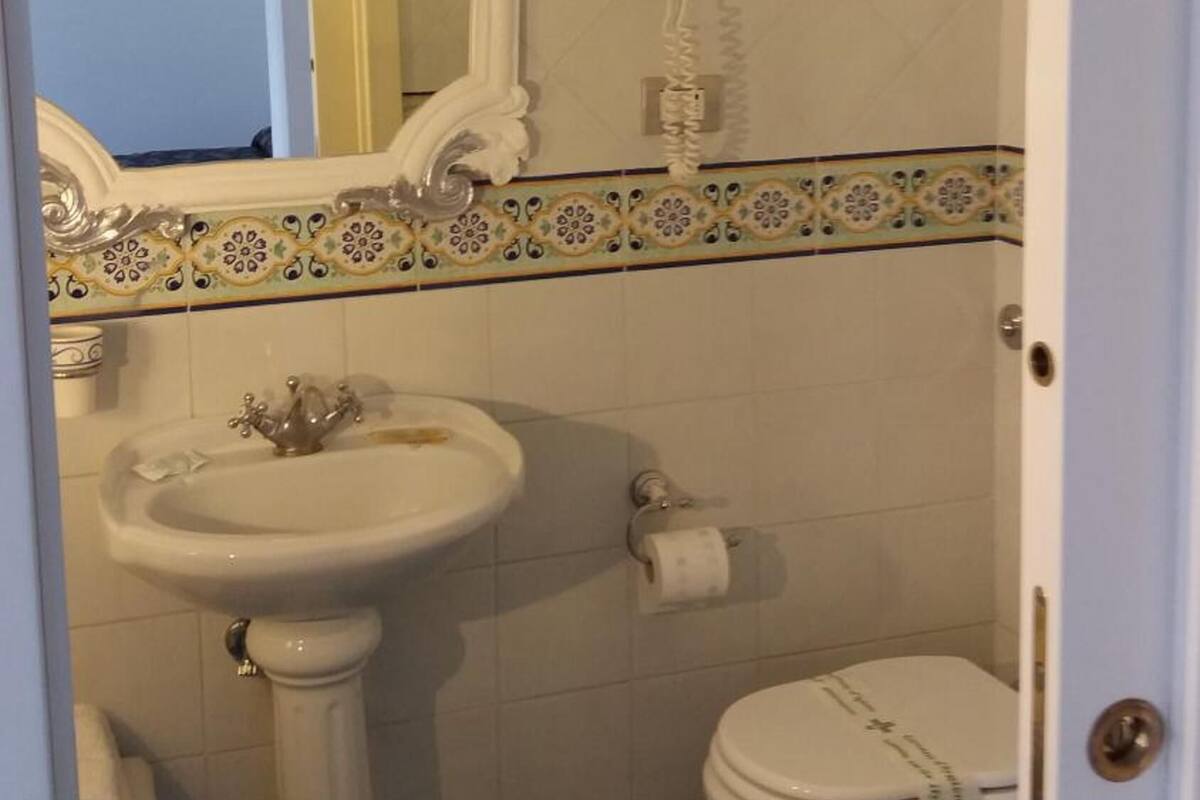 shower, rainfall showerhead, designer toiletries, hair dryer