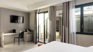 Habitación exclusiva | Minibar, escritorio, espacio para trabajar con laptop y wifi gratis