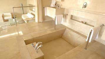 Combined shower/bathtub, free toiletries, hair dryer, bathrobes