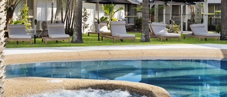 Outdoor pool, open 8:00 AM to 8:00 PM, pool loungers