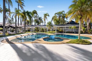 Outdoor pool, open 8:00 AM to 8:00 PM, pool loungers