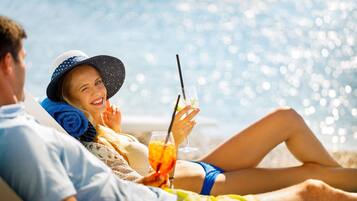Beach nearby, sun loungers, beach umbrellas, beach bar