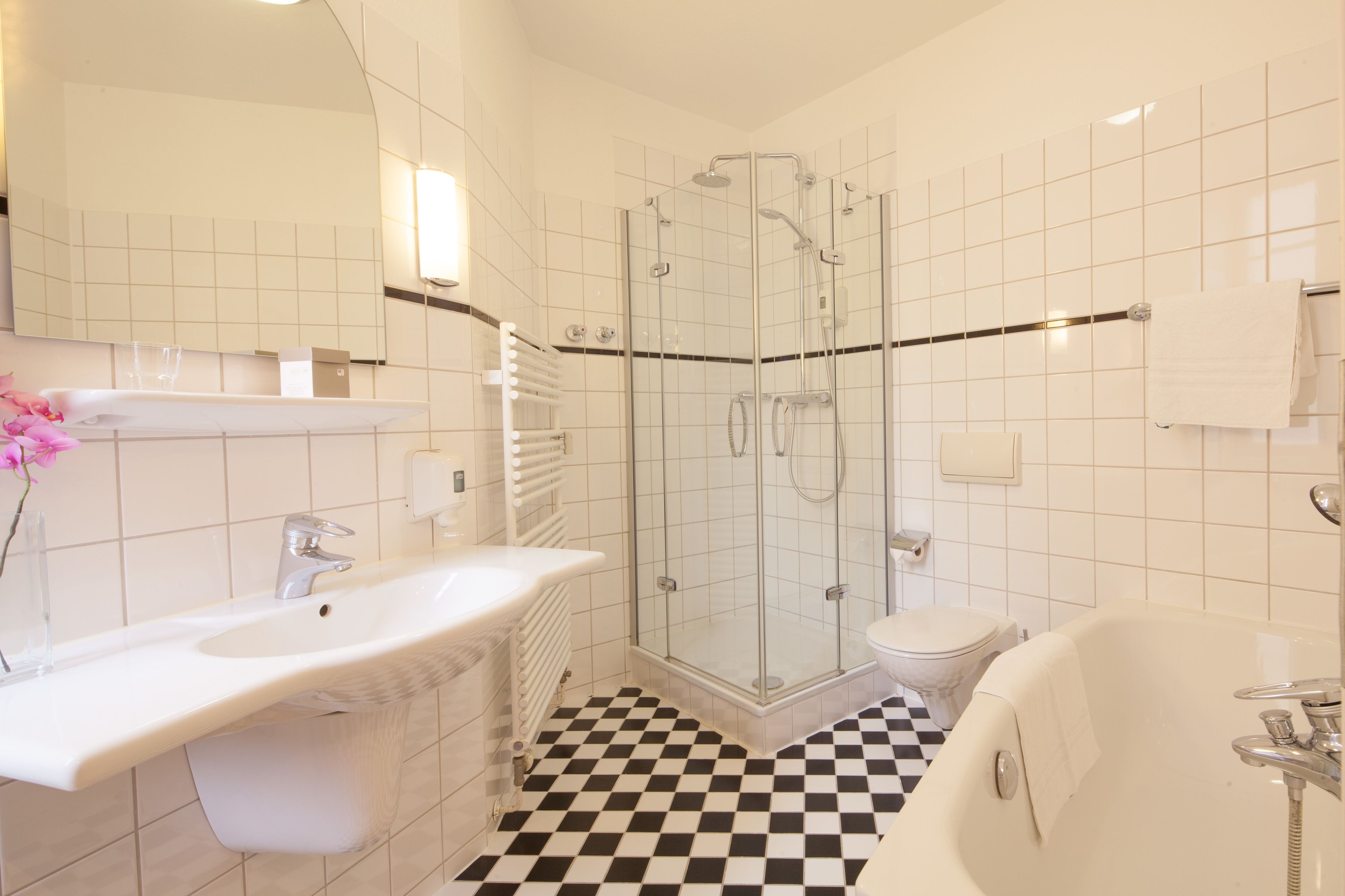 comfort room | bathroom | hair dryer, slippers, towels