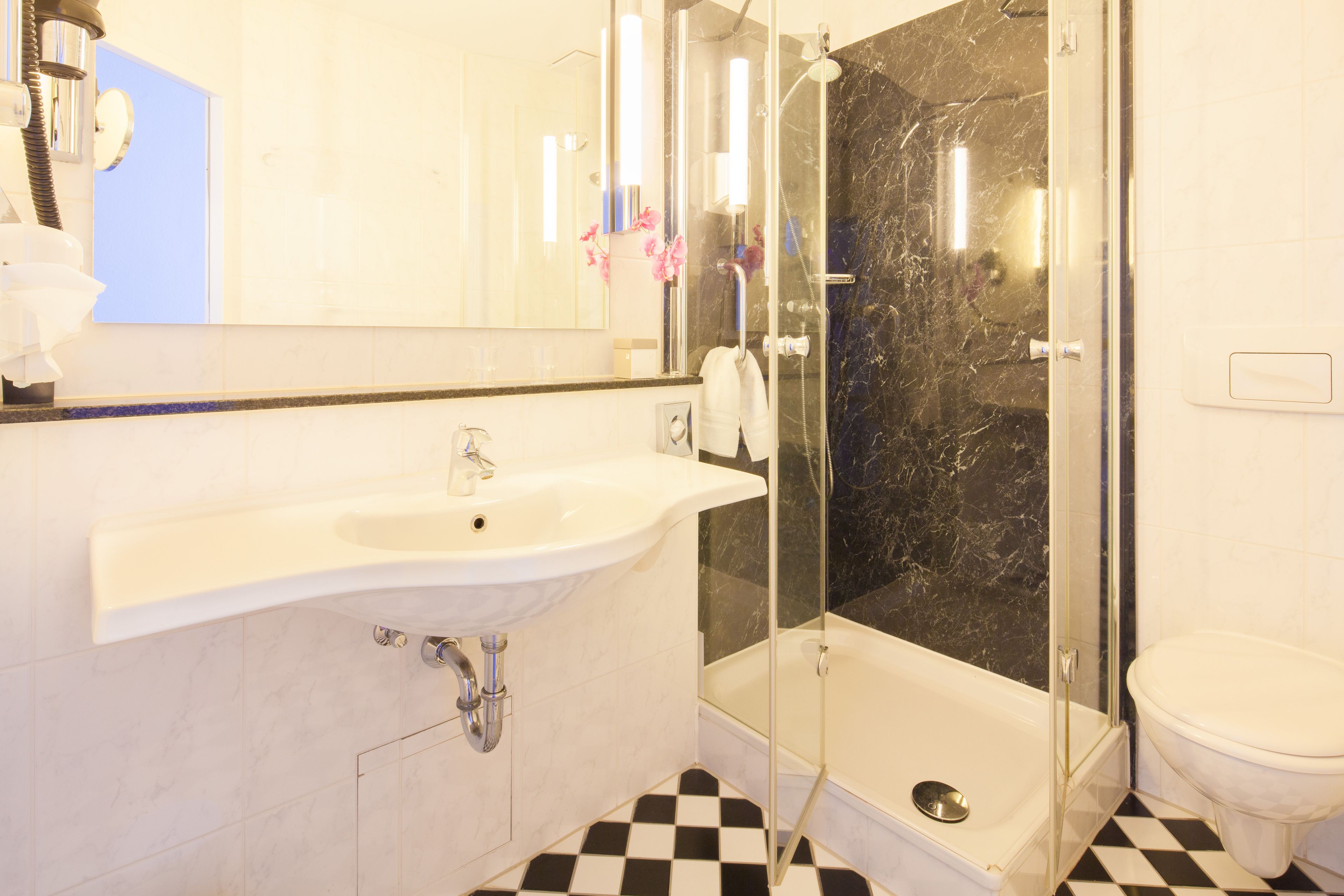 hair dryer, slippers, towels