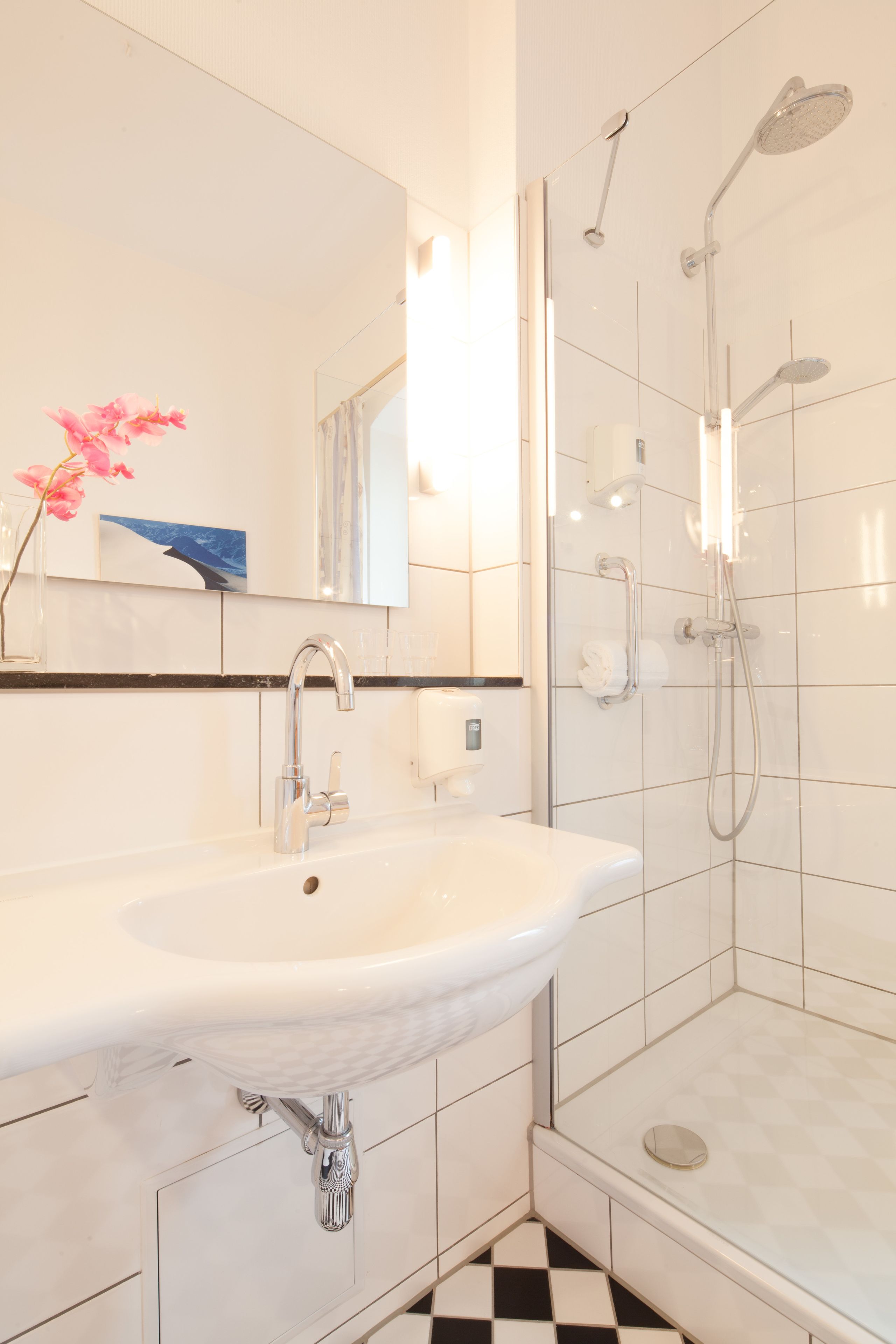 deluxe room | bathroom | hair dryer, slippers, towels