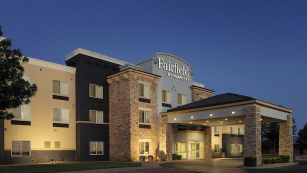A Fairfield by Marriott hotel with a modern design, featuring a brick facade and a covered entrance. - Fairfield Inn & Suites by Marriott Clovis (Clovis)