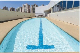 Outdoor pool, open 7:00 AM to 10:00 PM, sun loungers