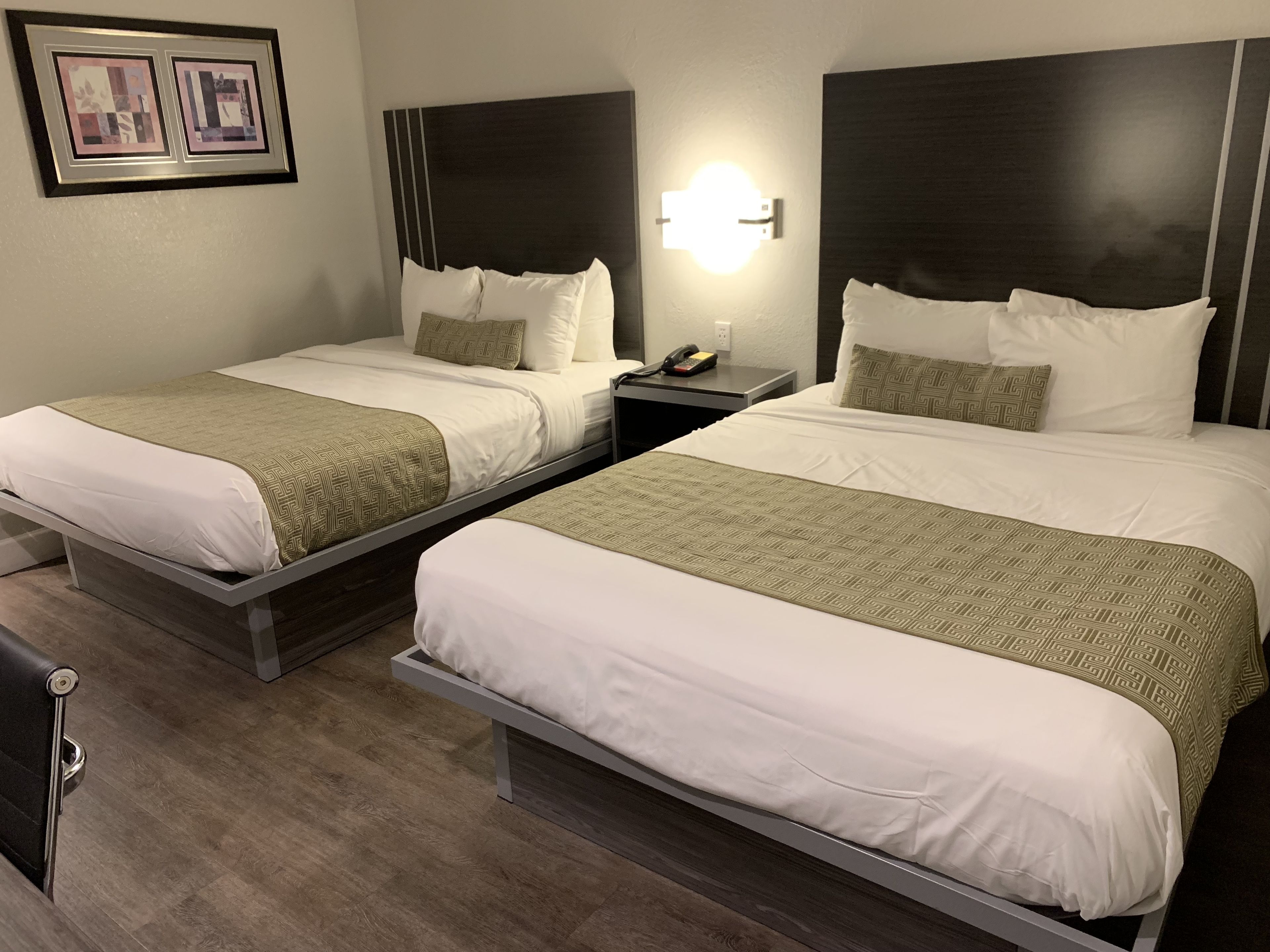 Room, 2 Queen Beds | Desk, blackout drapes, iron/ironing board, free WiFi