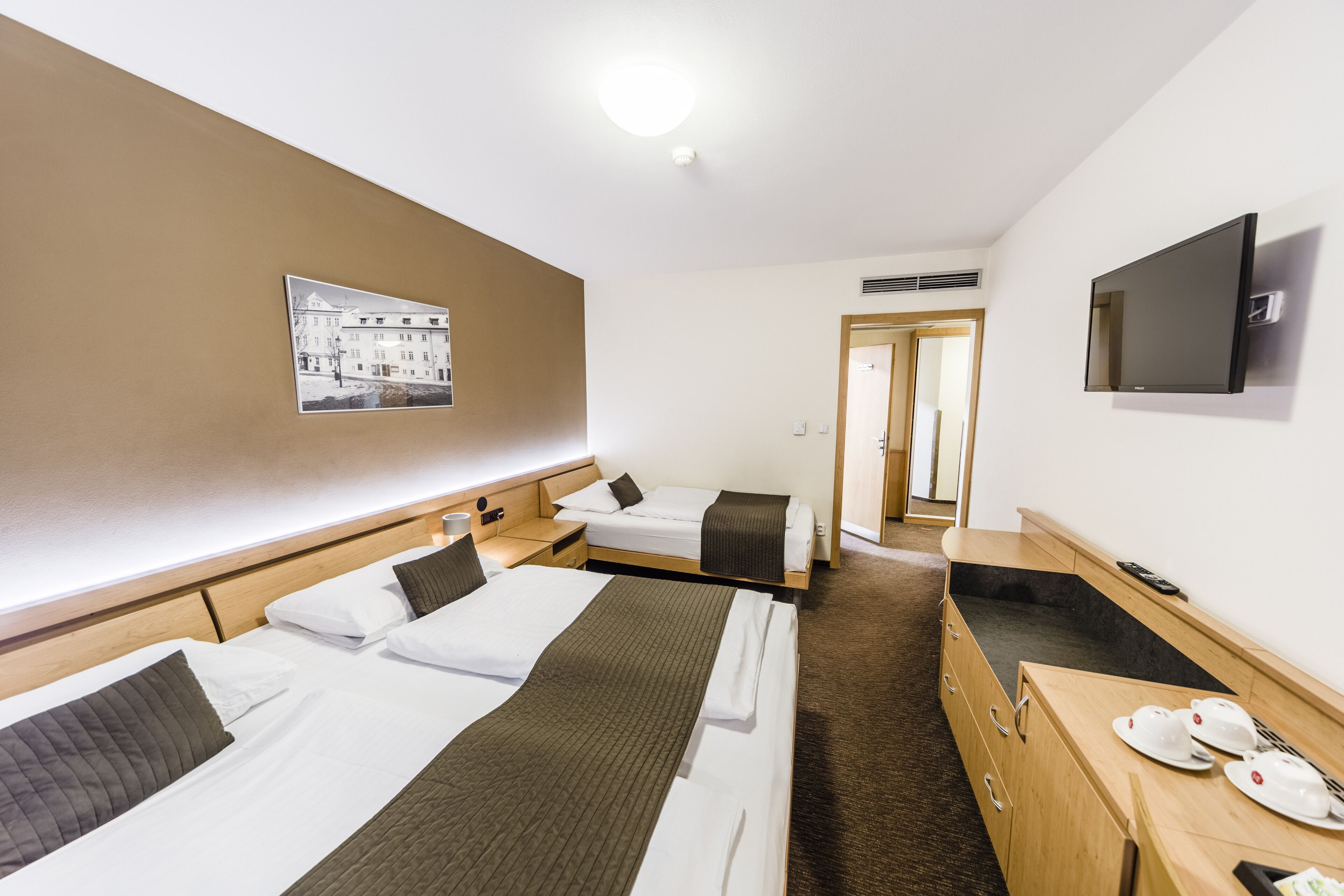 standard triple room | in-room safe, desk, blackout curtains, soundproofing