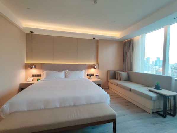 Quarto executivo | Frigobar, escrivaninha, cortinas blackout, Wi-Fi de cortesia