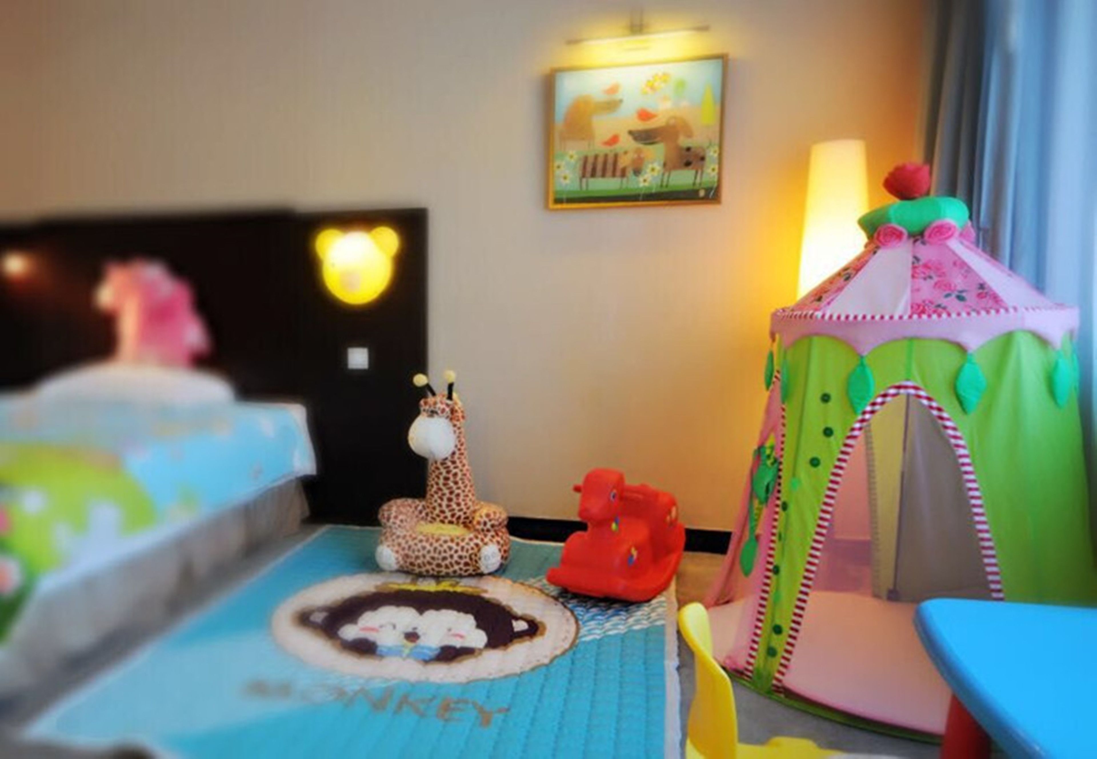 family room | 1 bedroom, minibar, in-room safe, desk