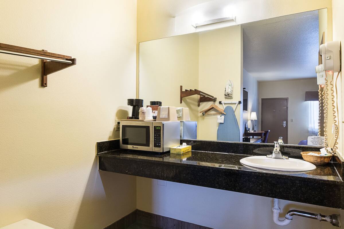 standard room, 1 bedroom, smoking, refrigerator & microwave | in-room safe, desk, iron/ironing board, free wired internet