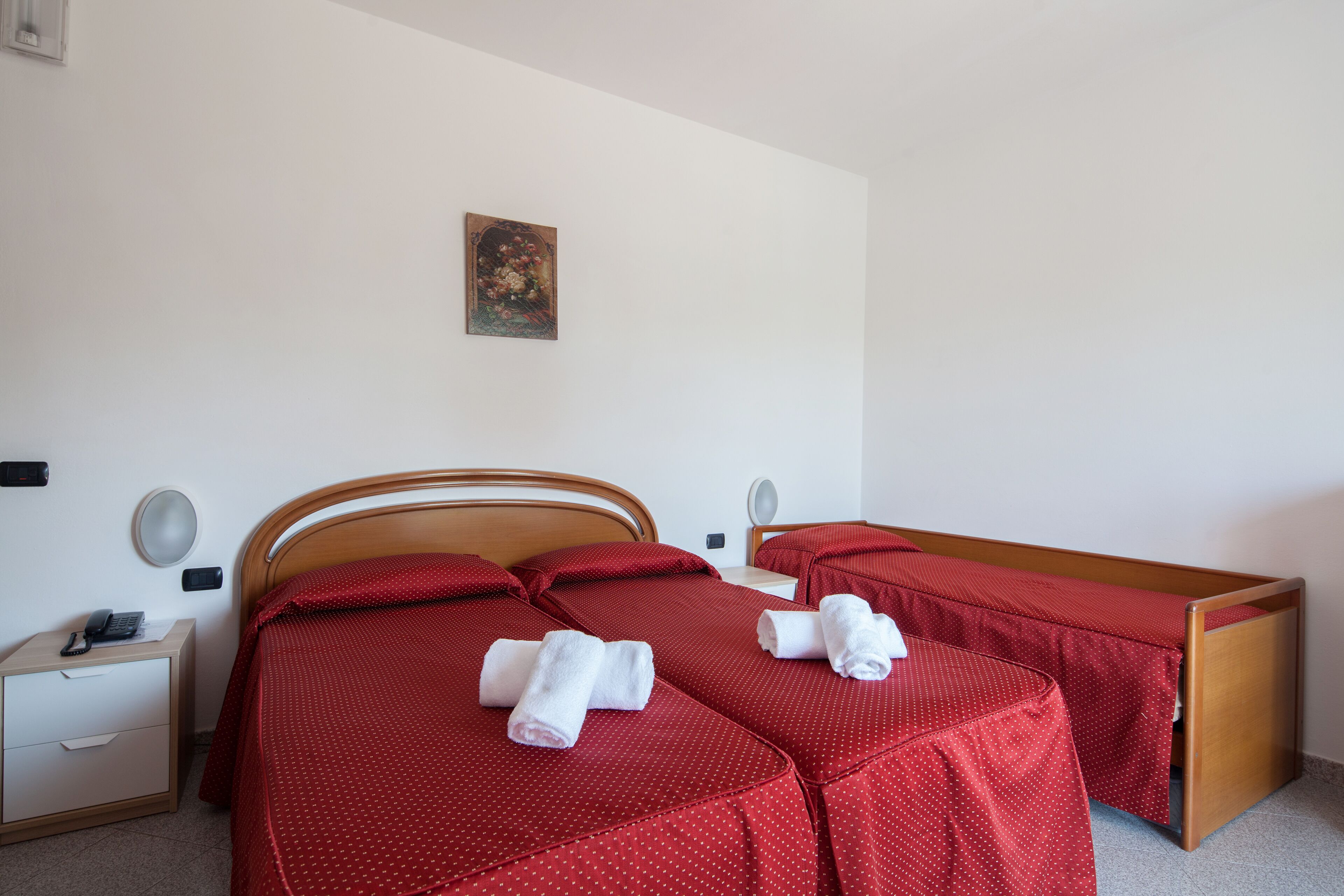 standard triple room | 1 bedroom, in-room safe, desk, blackout curtains