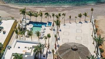 2 outdoor pools, open 7:00 AM to 9:00 PM, pool umbrellas