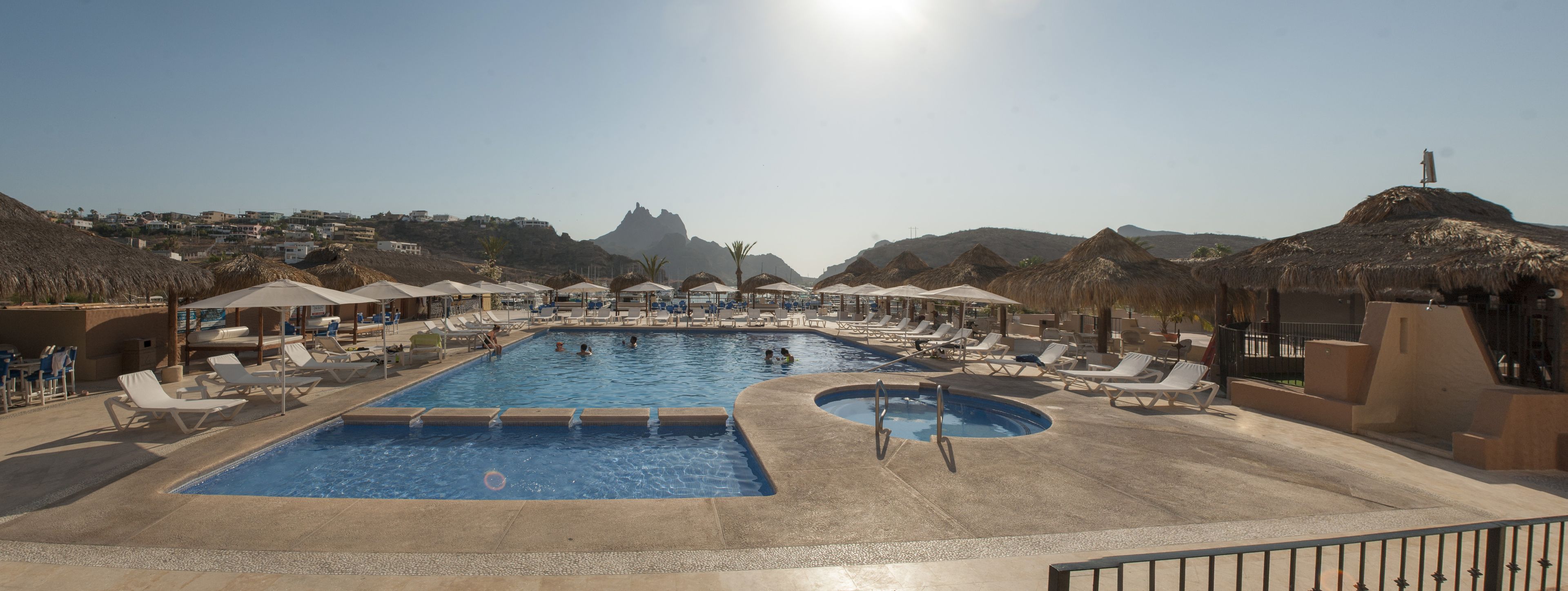 2 outdoor pools, open 7:00 AM to 9:00 PM, pool umbrellas